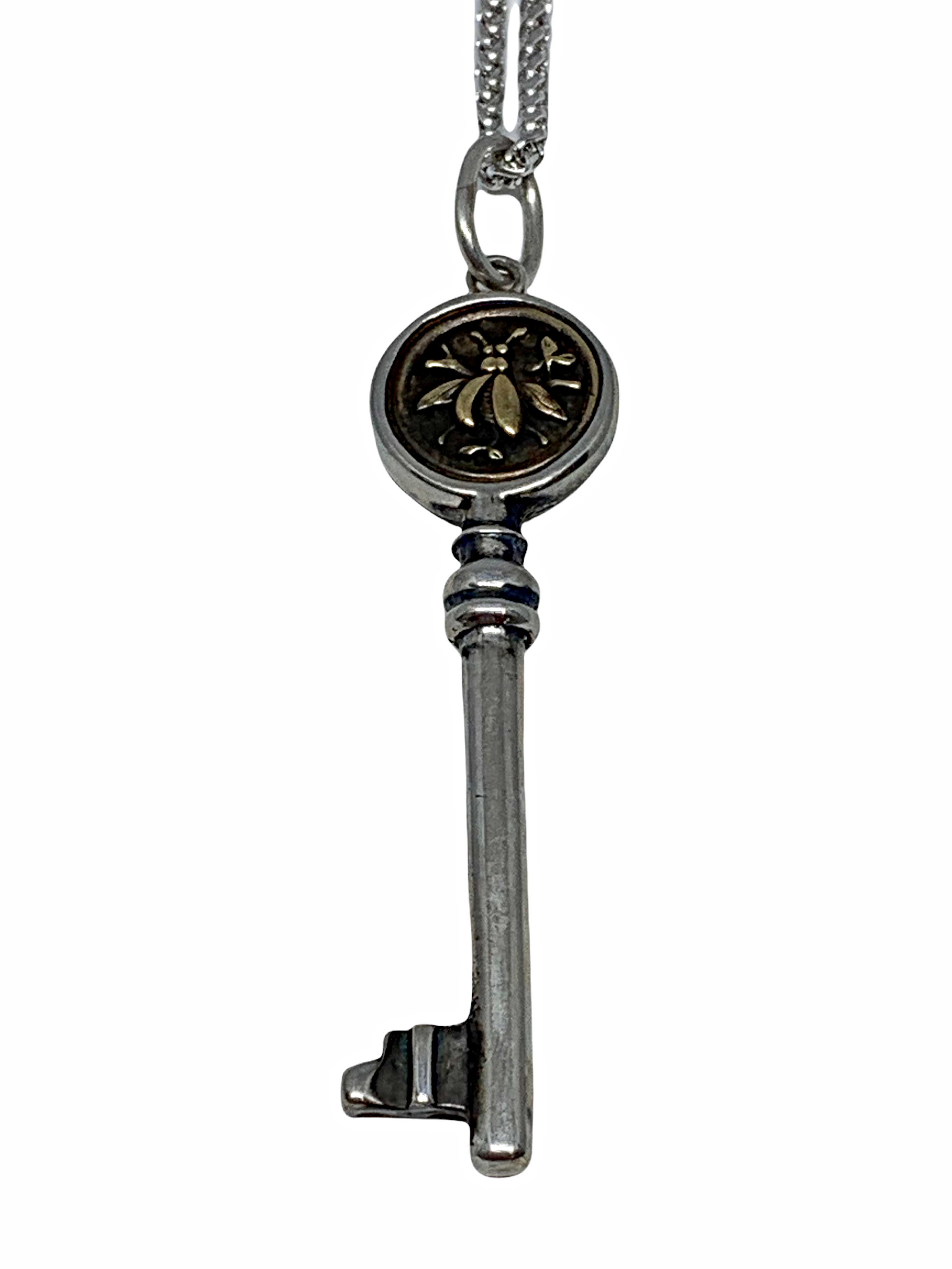 Handmade sterling silver bee key pendant  by Karyn Chopik | Effusion Art Gallery + Cast Glass Studio, Invermere BC