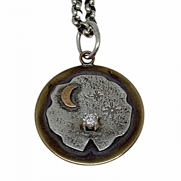 Handmade sterling silver, bronze, and CZ celestial pendant  by Karyn Chopik | Effusion Art Gallery + Cast Glass Studio, Invermere BC