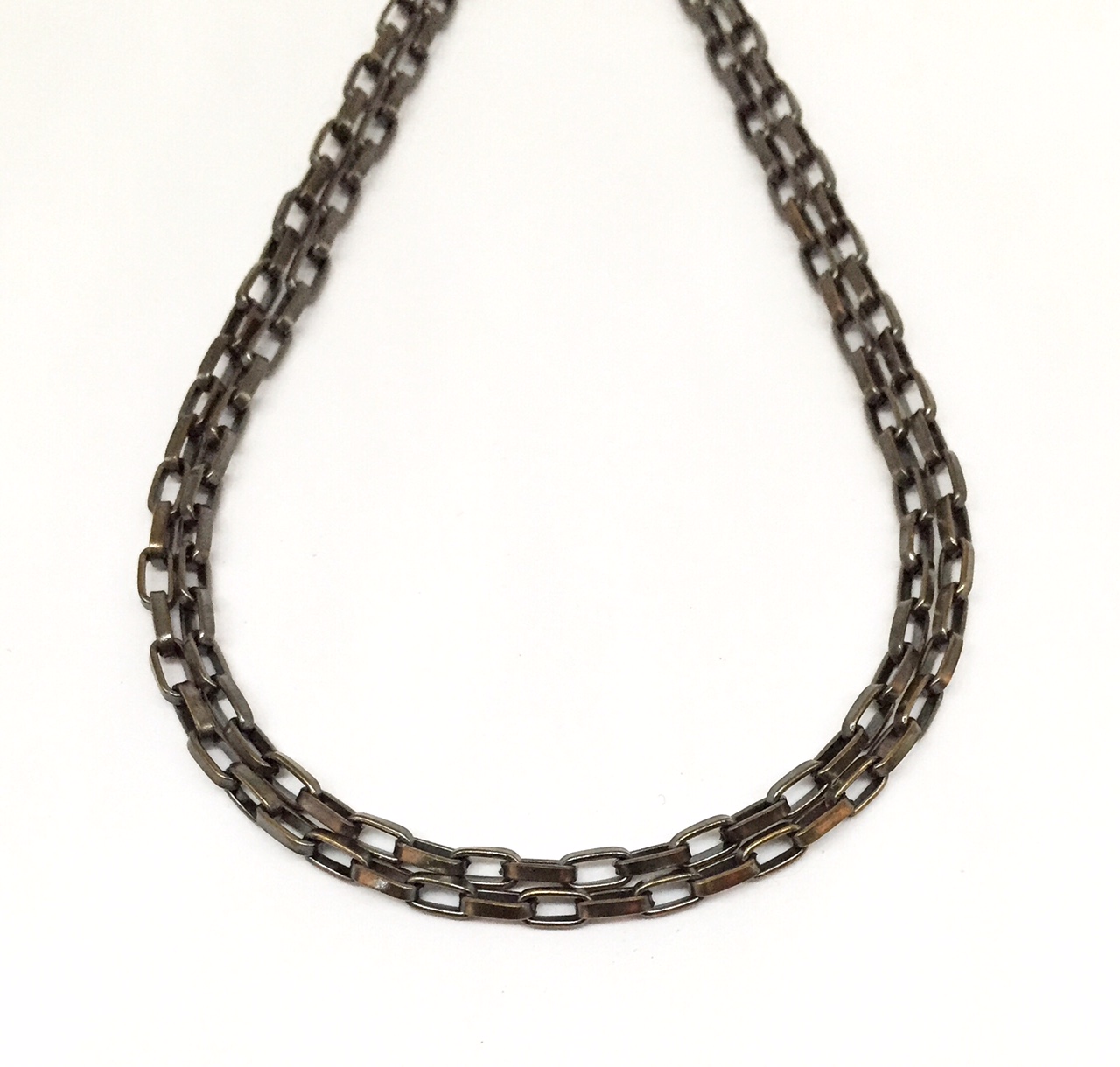 Bronze Karyn Chopik chain | Effusion Art Gallery + cast Glass Studio, Invermere BC