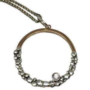 Sterling silver, bronze, + CZ pendant by Karyn Chopik | Effusion Art gallery + Cast Glass Studio, Invermere BC
