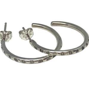 Textured sterling silver hoop earrings by Karyn Chopik | Effusion Art Gallery + Cast Glass Studio, Invermere BC