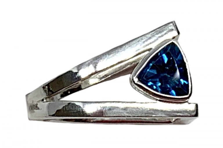 Sterling silver and 2 ct trillion London topaz ring by A&R Jewellery | Effusion Art Gallery + Cast Glass Studio, Invermere BC