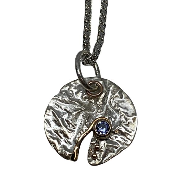 Sterling silver, bronze, and blue CZ pendant by Karyn Chopik | Effusion Art Gallery + Cast Glass Studio, Invermere BC