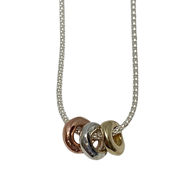 Handmade sterling silver, copper, and bronze necklace by Karyn Chopik | Effusion Art Gallery + Cast Glass Studio, Invermere BC