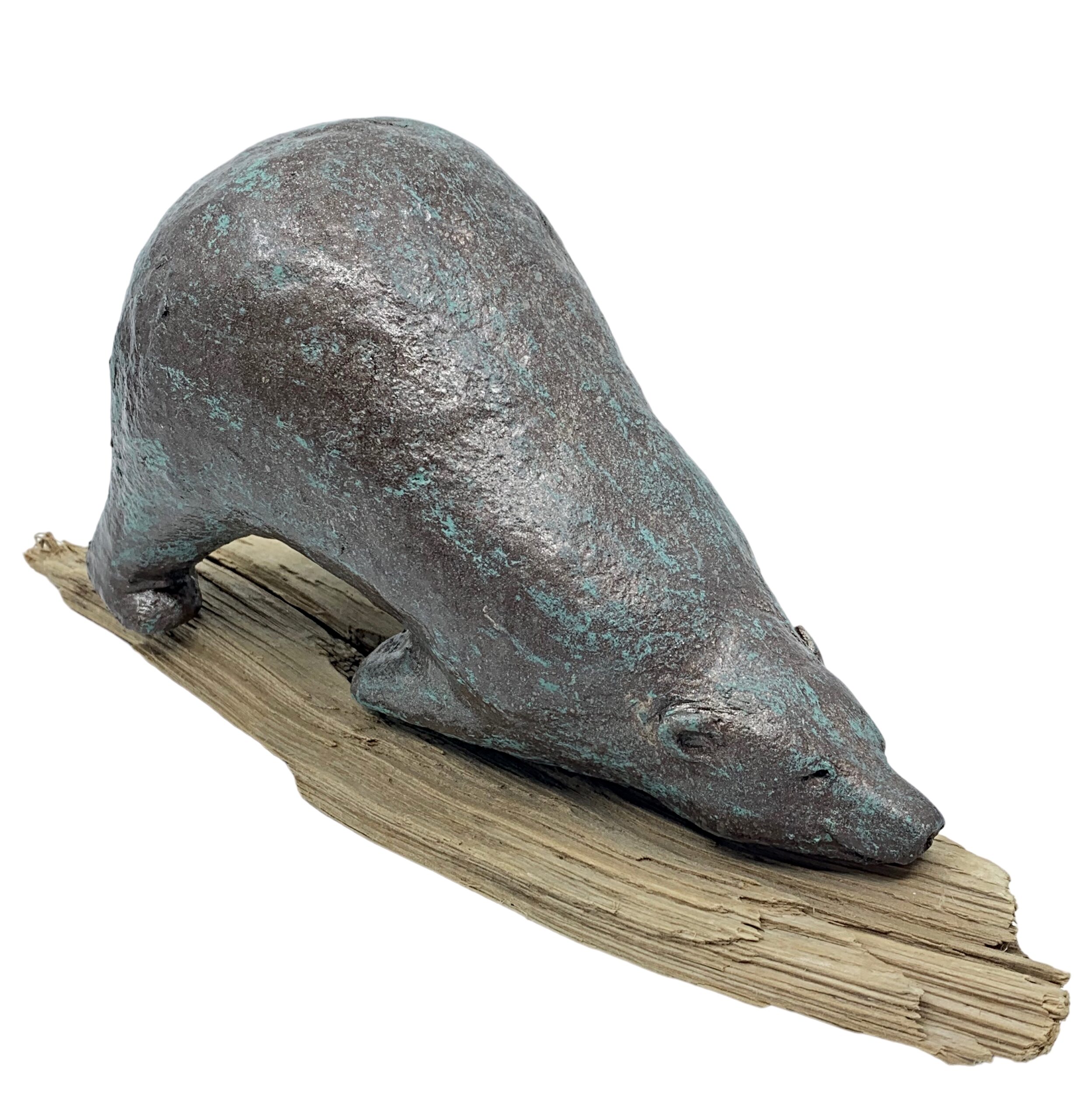 Sculpture of a whimsical friendly bear in the downward dog yoga pose on a driftwood yoga mat, with a bronze patina finish by Karin Taylor.