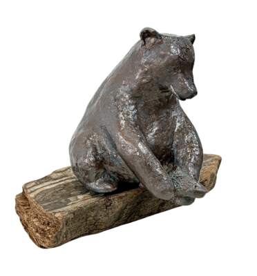 Salmon is Here, original mixed media sculpture of a friendly bear catching a fish by Canadian artist Karin Taylor at Effusion Art Gallery in Invermere, BC.