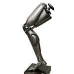 Hermes, original metal robot-inspired leg and foot sculpture by Canadian artist Cory Fuhr at Effusion Art Gallery in Invermere, BC.