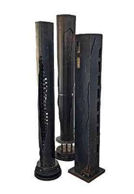 Earth, Water, Air and Fire, set of three one-of-a-kind reclaimed metal sculptures that are lit within by Canadian metal artist Wendy Stone at Effusion Art Gallery in Invermere, BC.