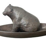 Canoe Bear, original mixed media sculpture of a cute bear sitting in a canoe by Canadian artist Karin Taylor at Effusion Art Gallery in Invermere, BC.