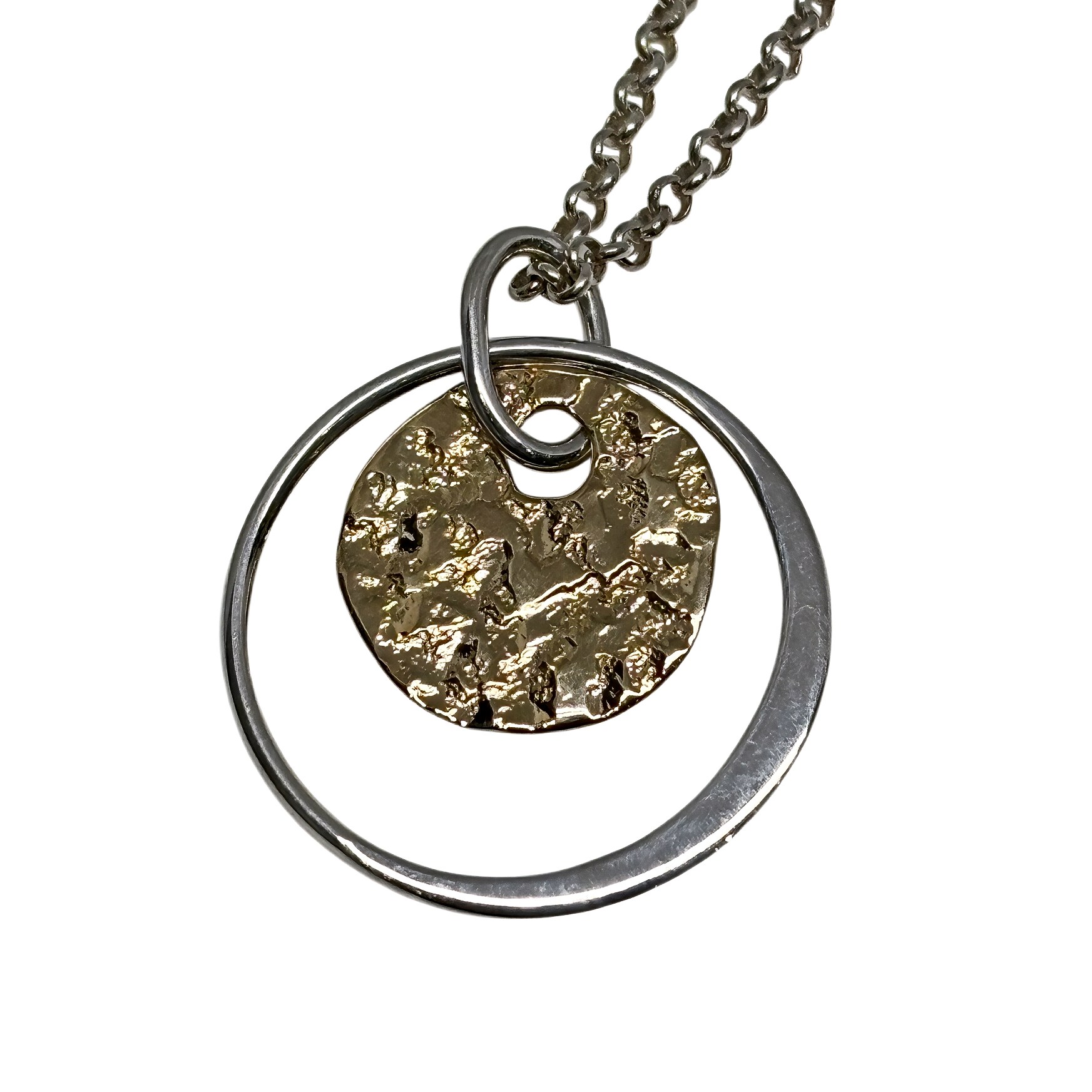 Handmade sterling silver and bronze pendant by Canadian jewelry artist Karyn Chopik at Effusion Art Gallery in Invermere, BC.