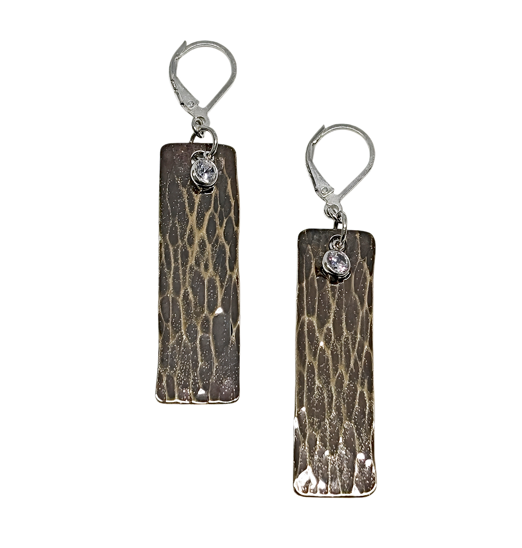 Handmade bronze, sterling silver, + cubic zirconia earrings with removable oxidized silver charm by Canadian artist Karyn Chopik at Effusion Art Gallery in Invermere, BC.