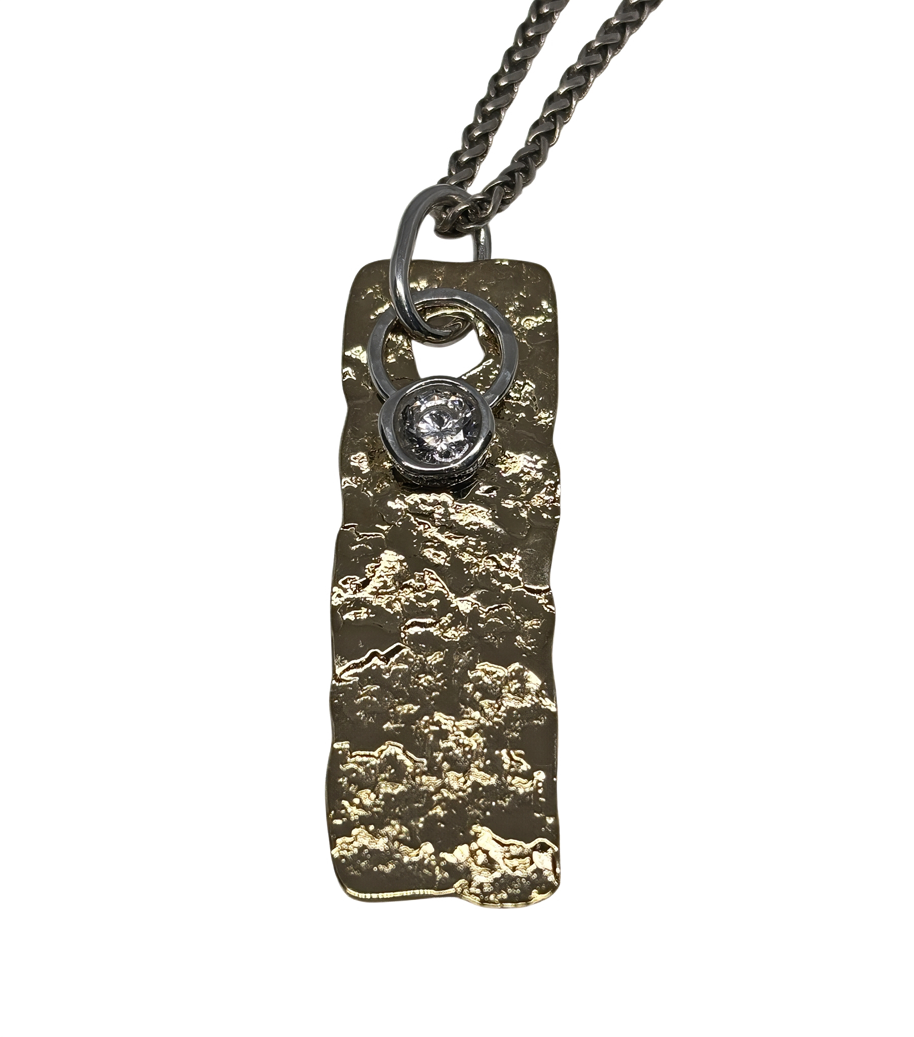 Handmade bronze, sterling silver, + 6mm cubic zirconia pendant by Canadian jewelry artist Karyn Chopik at Effusion Art Gallery in Invermere, BC.